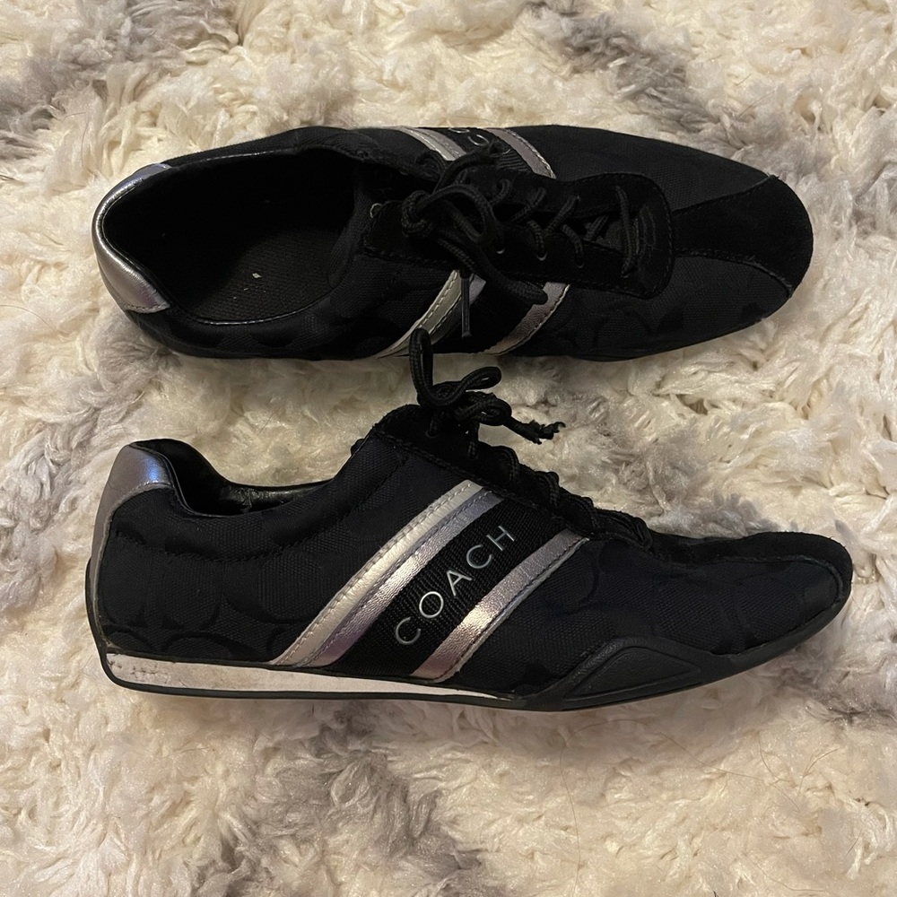 Used. Size 7 Black Coach shoes.